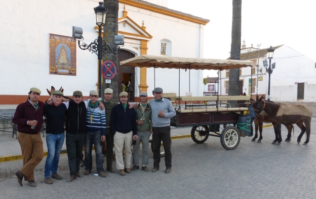 Los Niños de la Hermandad de Malaga la Caleta, in the main square of my town that evening, where I joined them for a drink to conclude my 'working' day. Your intrepid anthropologist is wearing blue jeans and standing next to Friar Tuck, who is wearing a gilet in place of his monk's habit.